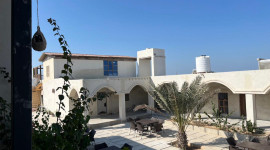 مجتمع ساحلی غروب هنگام قشم
